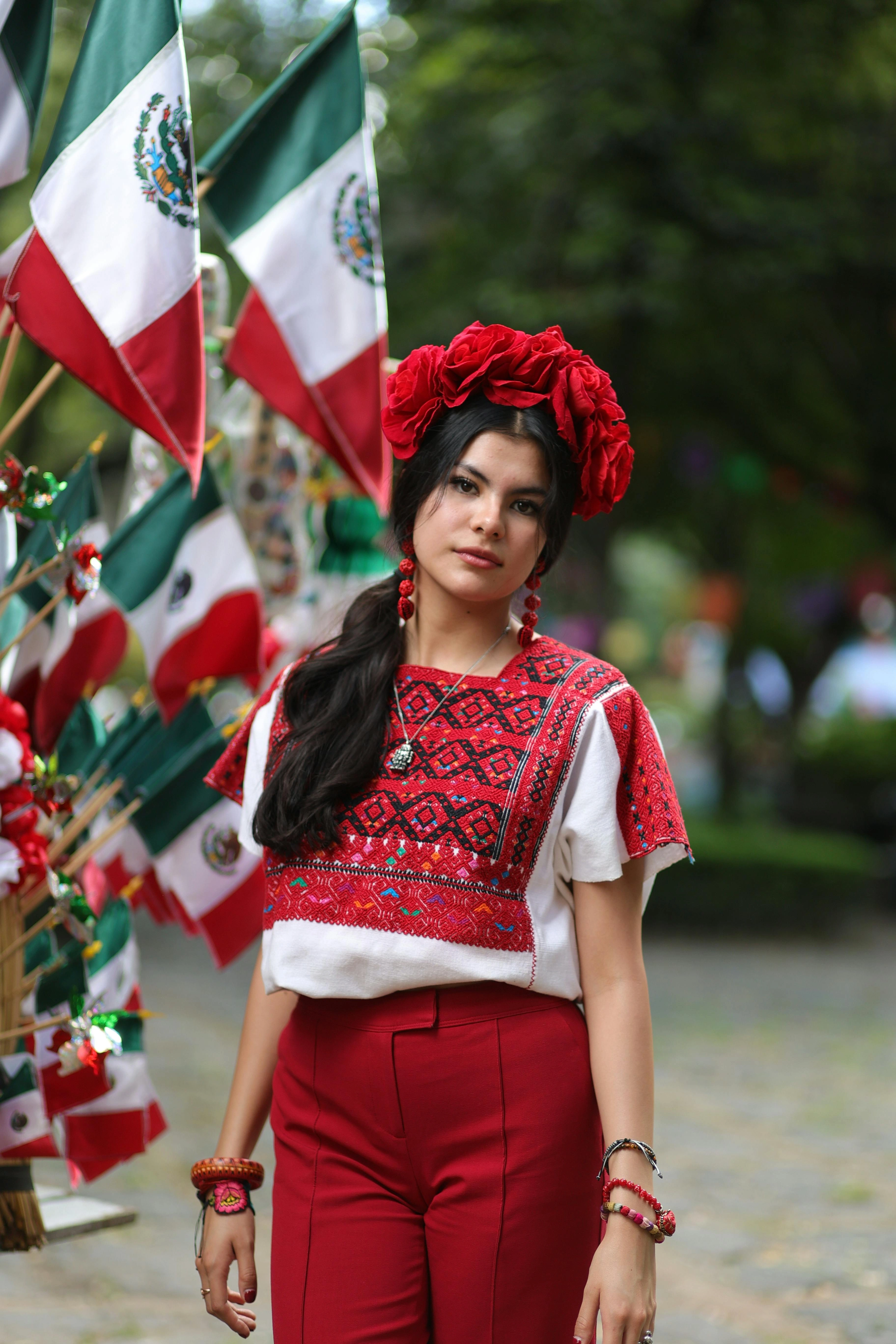 Modern Mexican inspired fashion portrait with red embroidered blouse